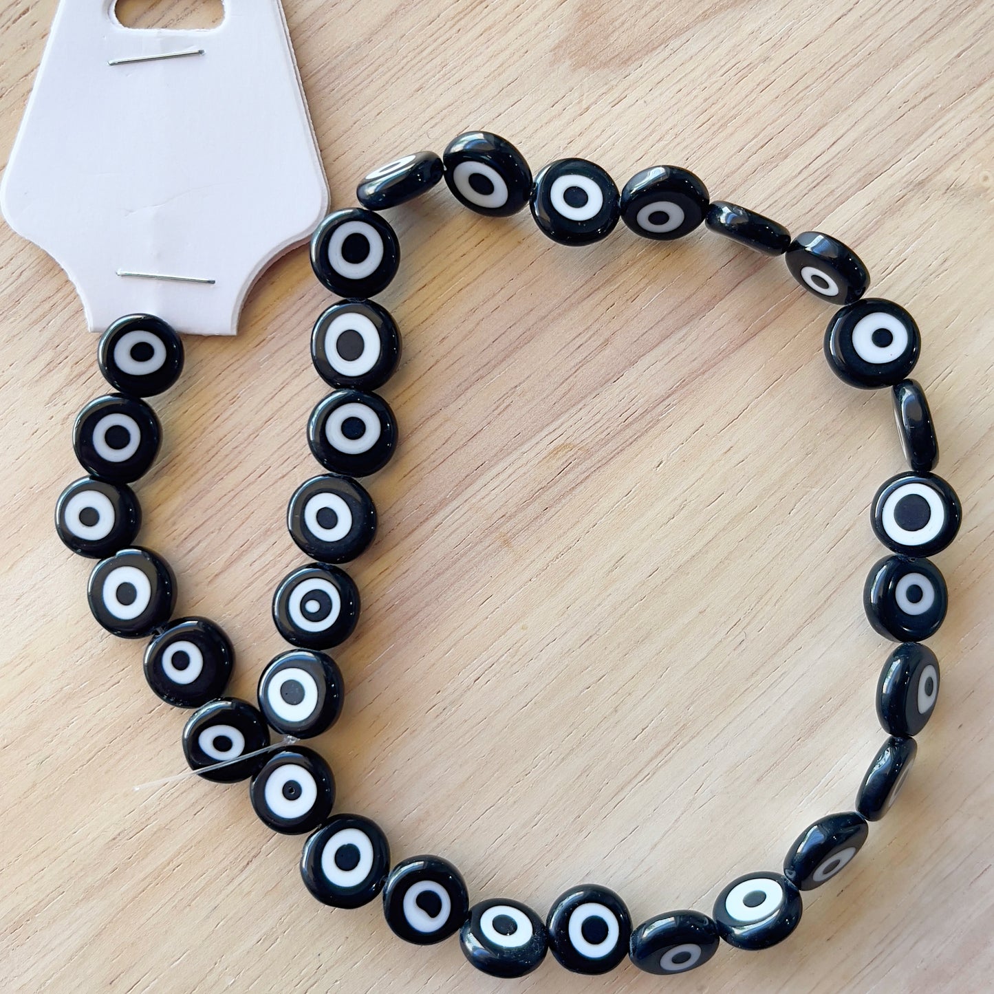 Black Evil Eye strand 12mm