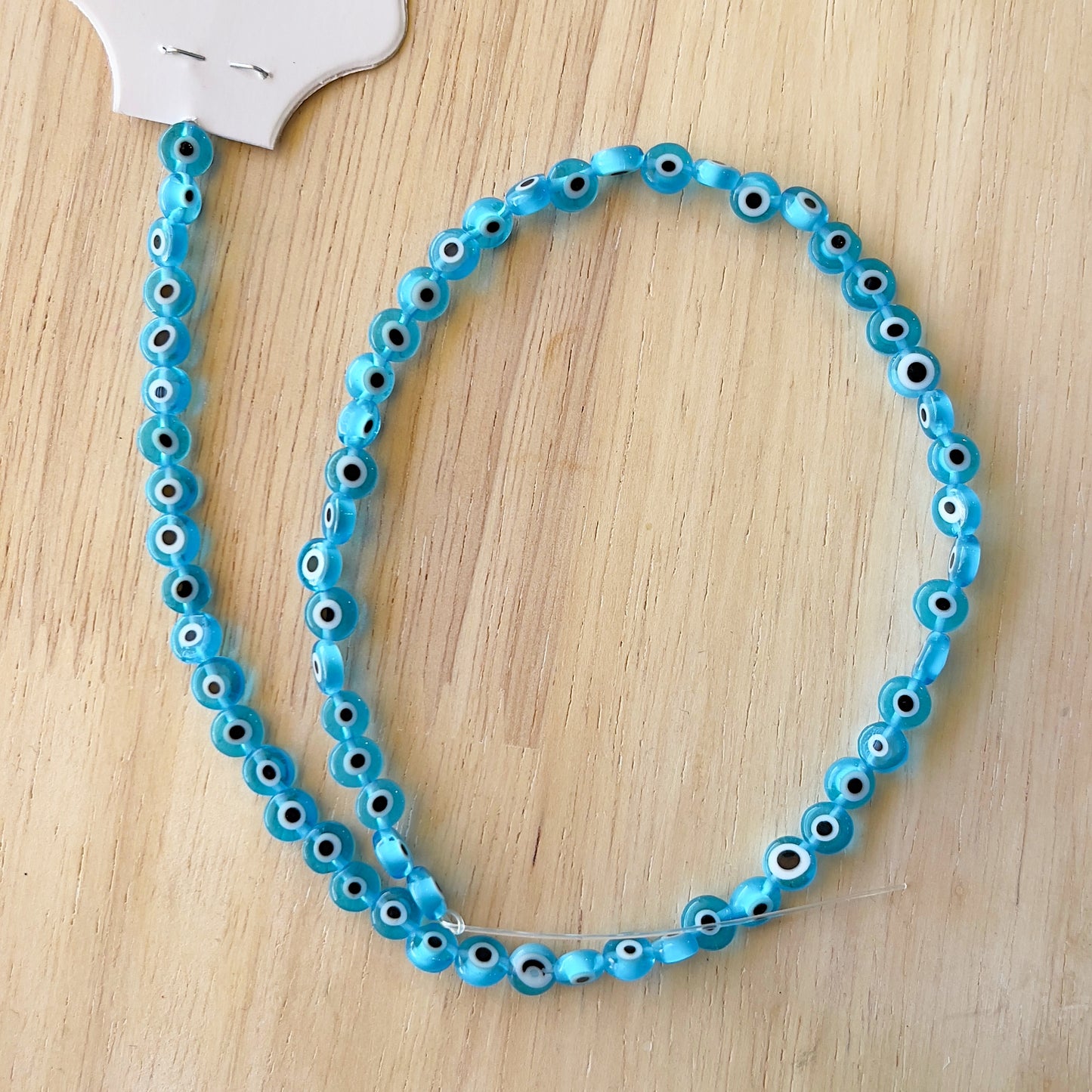 Light Blue Evil Eye strand 6mm